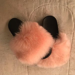 Pink faux fur slides